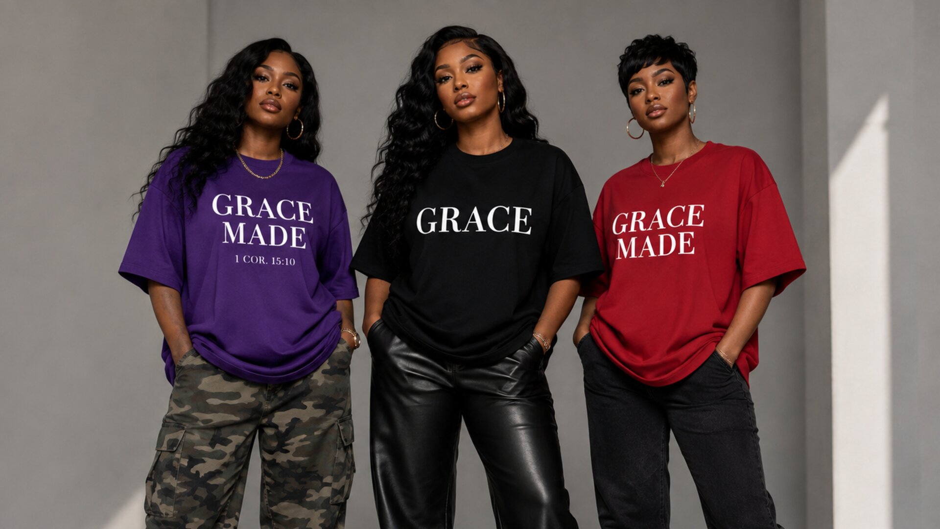 Three models wearing Grace Made oversized t-shirts in purple, black, and red